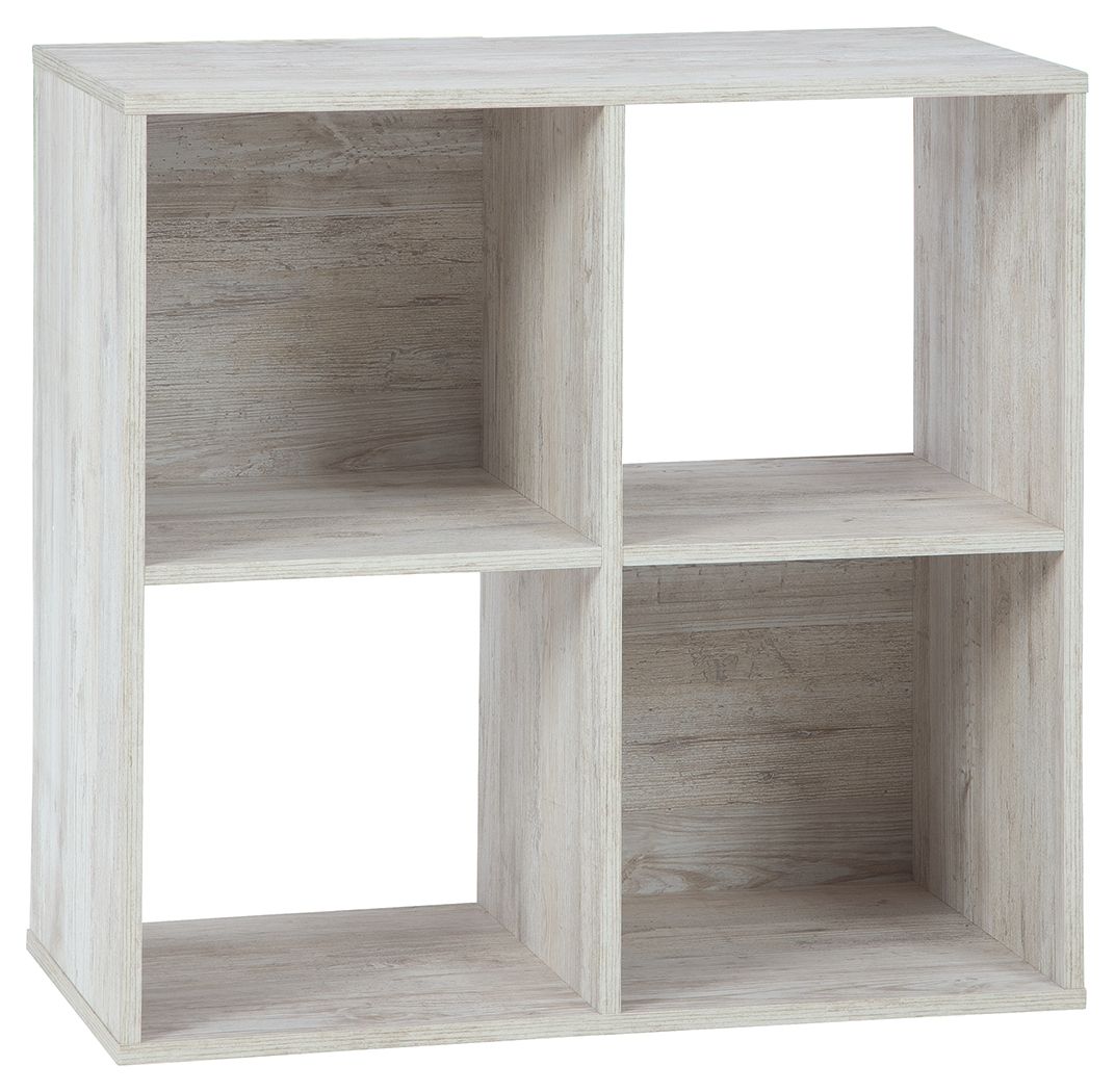 Whitewashed wood cube organizer with open cubbies in a square layout