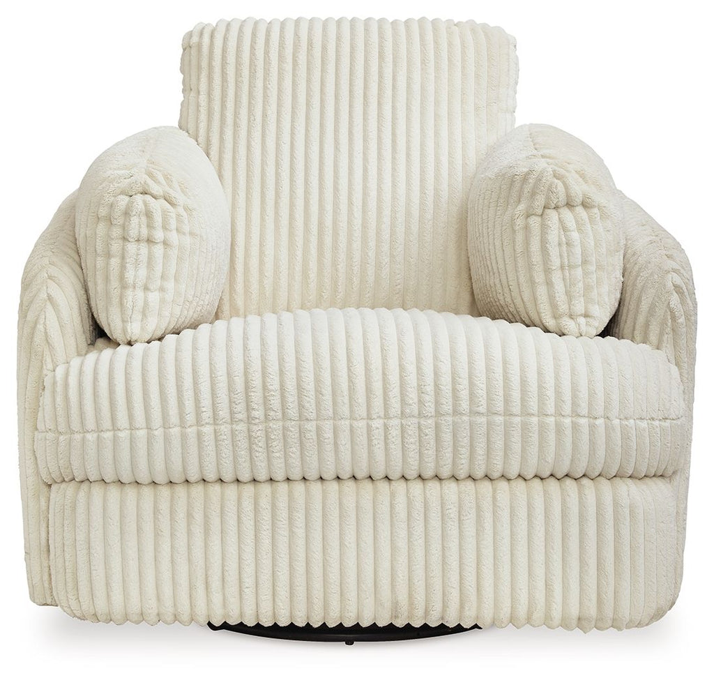 Ivory ribbed recliner with tall back and rounded rolled arm cushions.