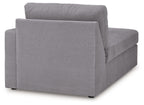 Gray fabric chaise corner with tall back and boxy seat