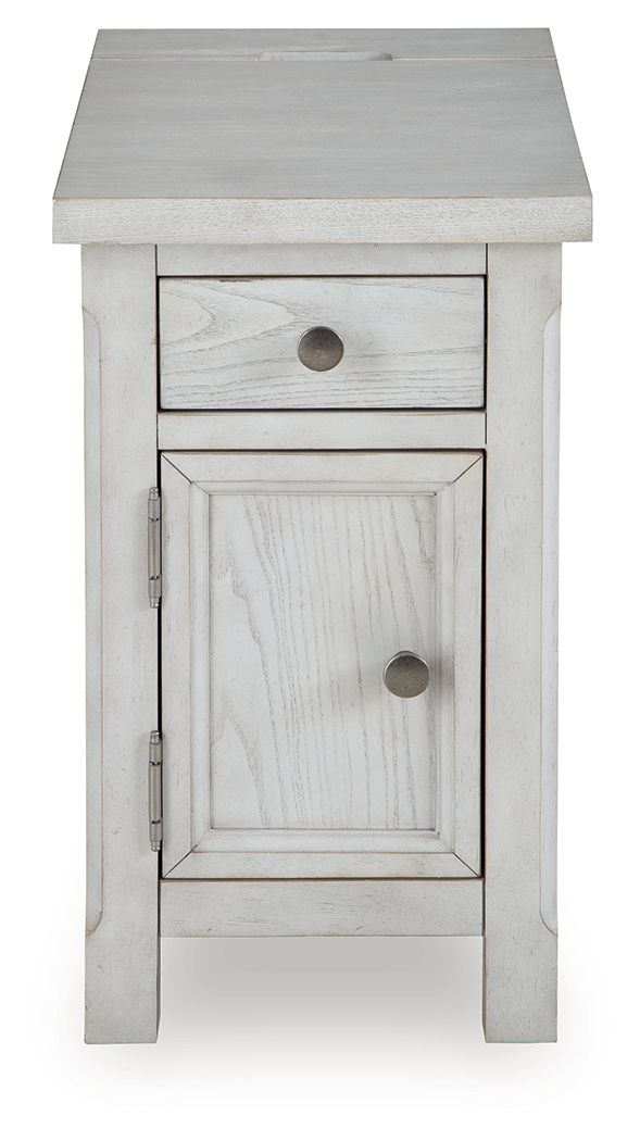 White side table with a top drawer and cabinet door, featuring round metal knobs.