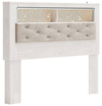 White panel bookcase headboard with tufted fabric center and top open shelf