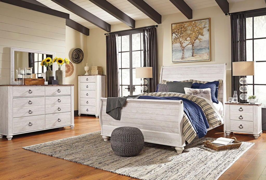 Bedroom furniture set with bed, dresser, and nightstands in light beige finish