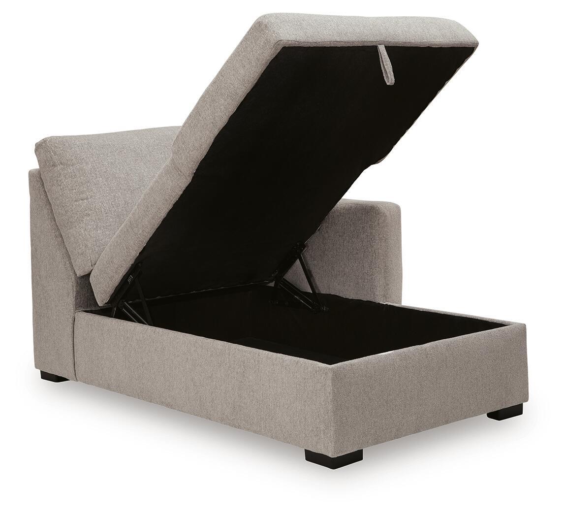 Flint gray corner chaise with storage, lid open showing black storage compartment