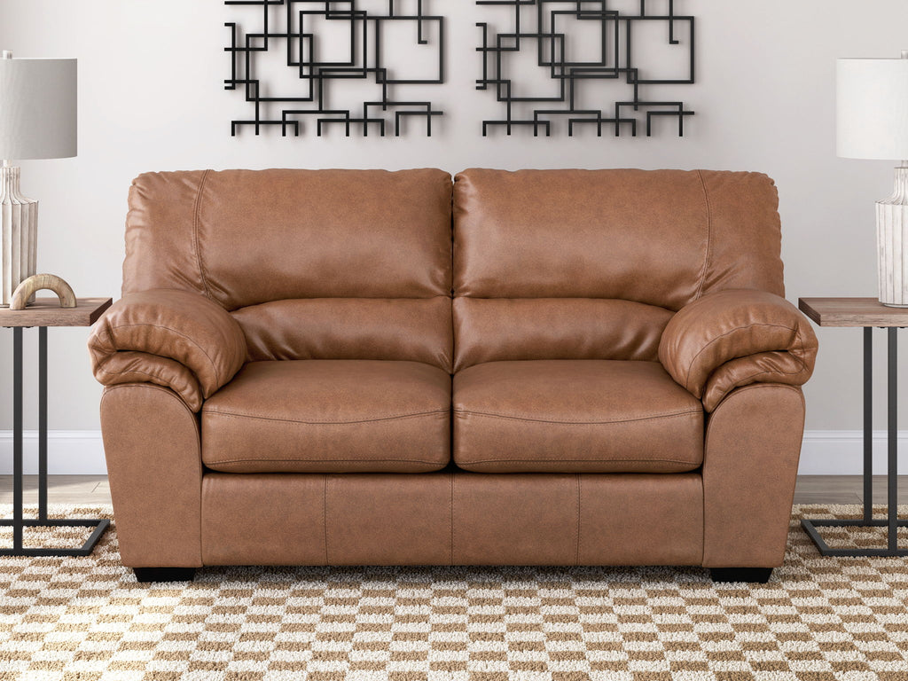 WillowBend loveseat in light brown with pleated back cushions and rolled armrests
