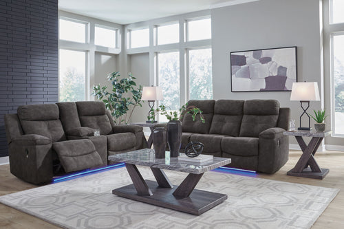 Dark gray reclining sofa and loveseat set with padded armrests