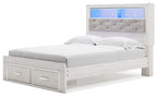 White bookcase bed with tufted gray headboard, blue-lit shelves, and two front drawers
