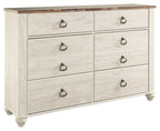 Whitewash wood dresser with six drawers and dark metal knob pulls