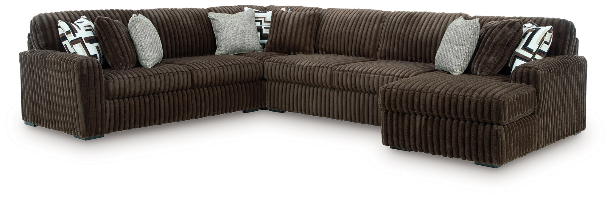 Brown corduroy sectional sofa with chaise corner and geometric throw pillows