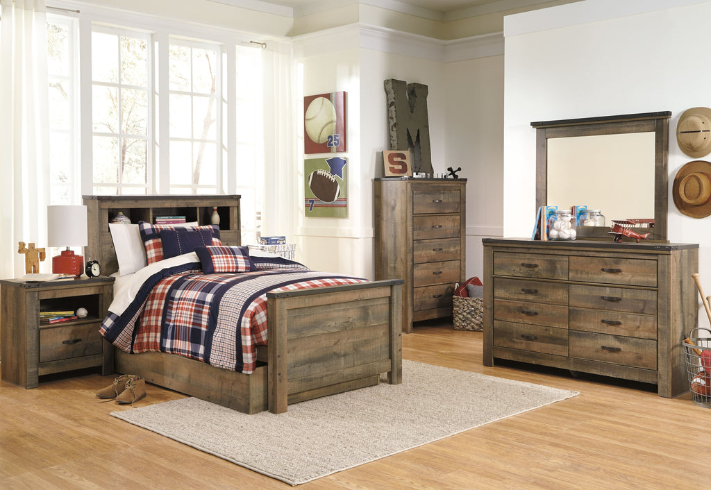 Twin bookcase bed with storage drawer, brown wood frame and plaid bedding