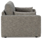 Granite upholstered loveseat side view with rolled arm and back cushion