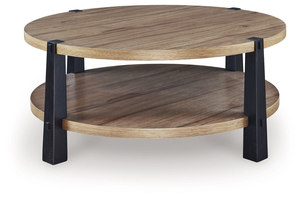 Round two-tier end table with light brown wood top, lower shelf, and dark legs.