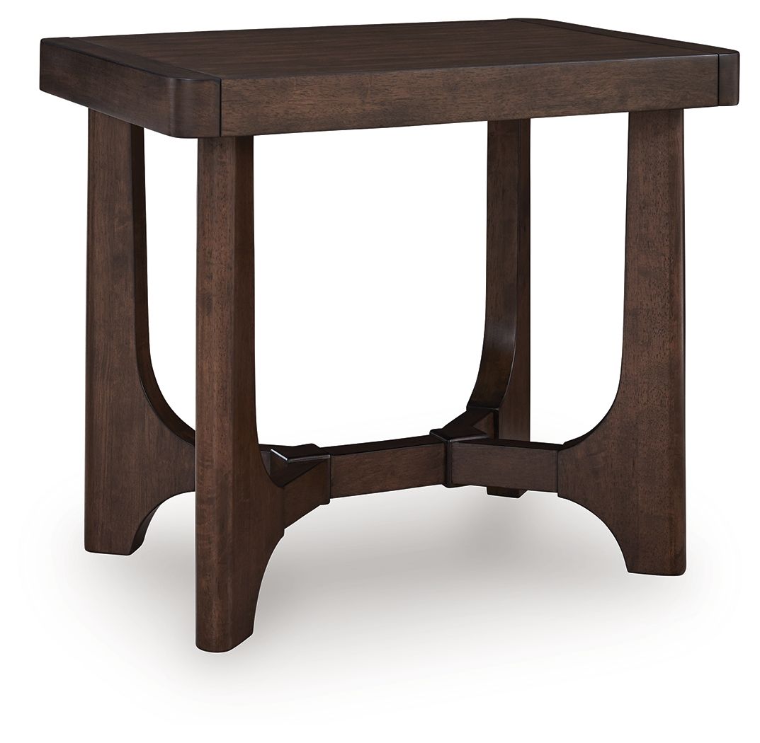 Dark brown rectangular cocktail table with open curved apron and cross brace detail