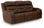 Dark brown power reclining sofa with tufted seat cushions and side control panel