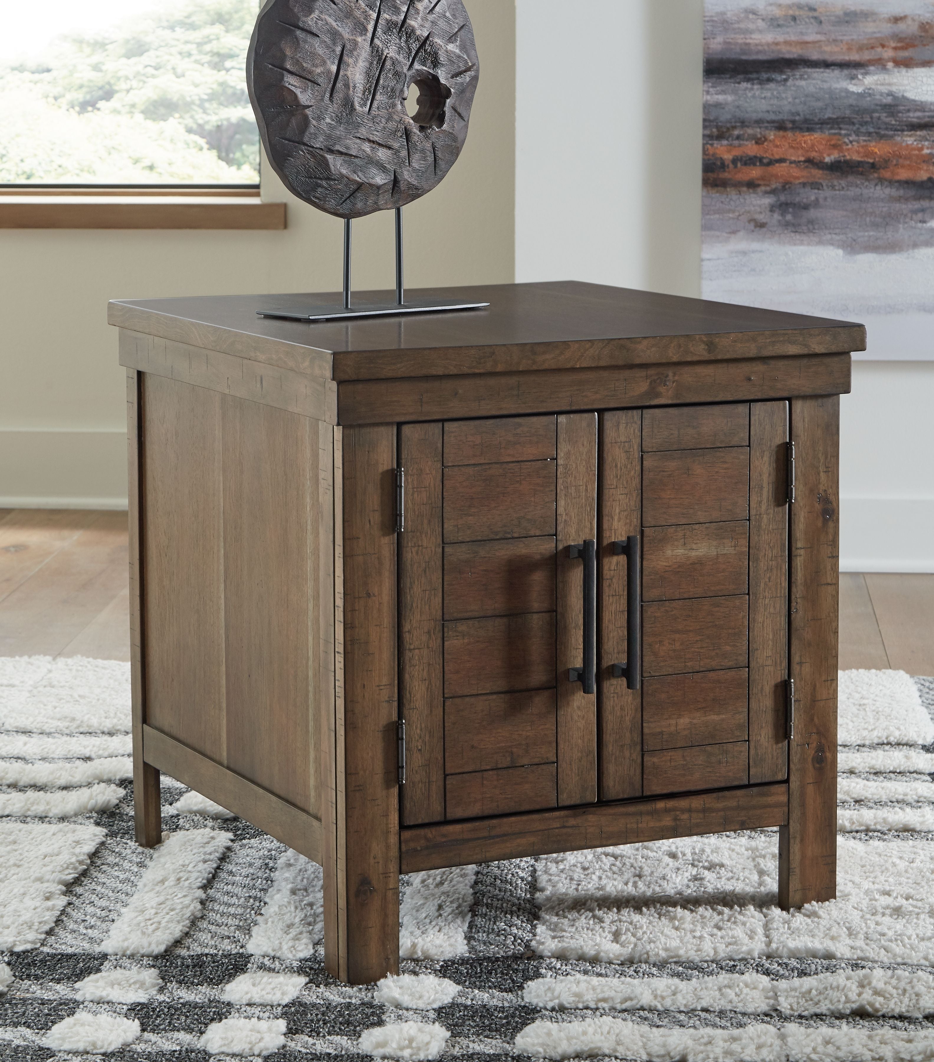 Rectangular end table with grayish-brown cabinet doors and black handles