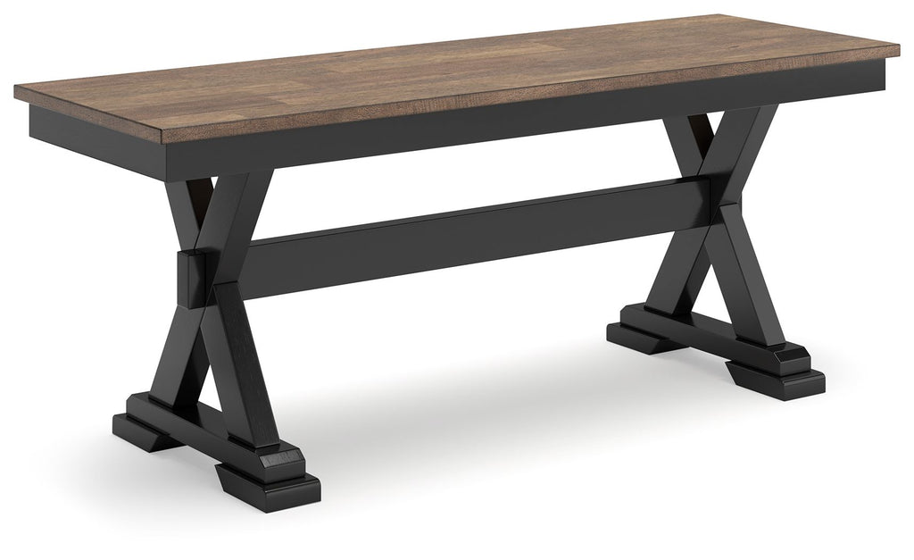 Dark brown dining bench with black X base and slatted underframe.