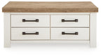 Rectangular table with wood top, four drawer fronts, and dark bronze bar handles.