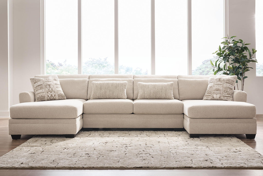 Mandi Point light beige sectional sofa with chaise and three throw pillows