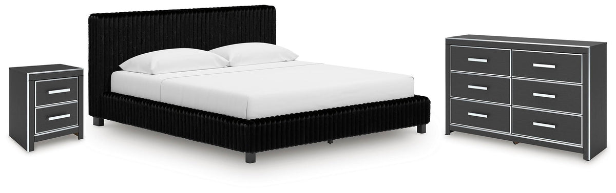 Black upholstered bed with nightstand and drawer dresser