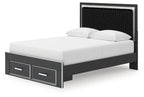 Black upholstered panel platform bed with storage drawers and slatted frame, side view