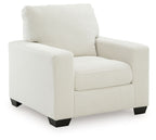 Upholstered armchair with striped fabric, rolled back, padded arms, and dark block legs.