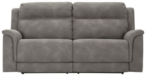 Power reclining sofa, dark slate gray upholstery, padded arms and back cushions