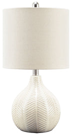 Ceramic table lamp with off-white fabric shade and textured off-white base