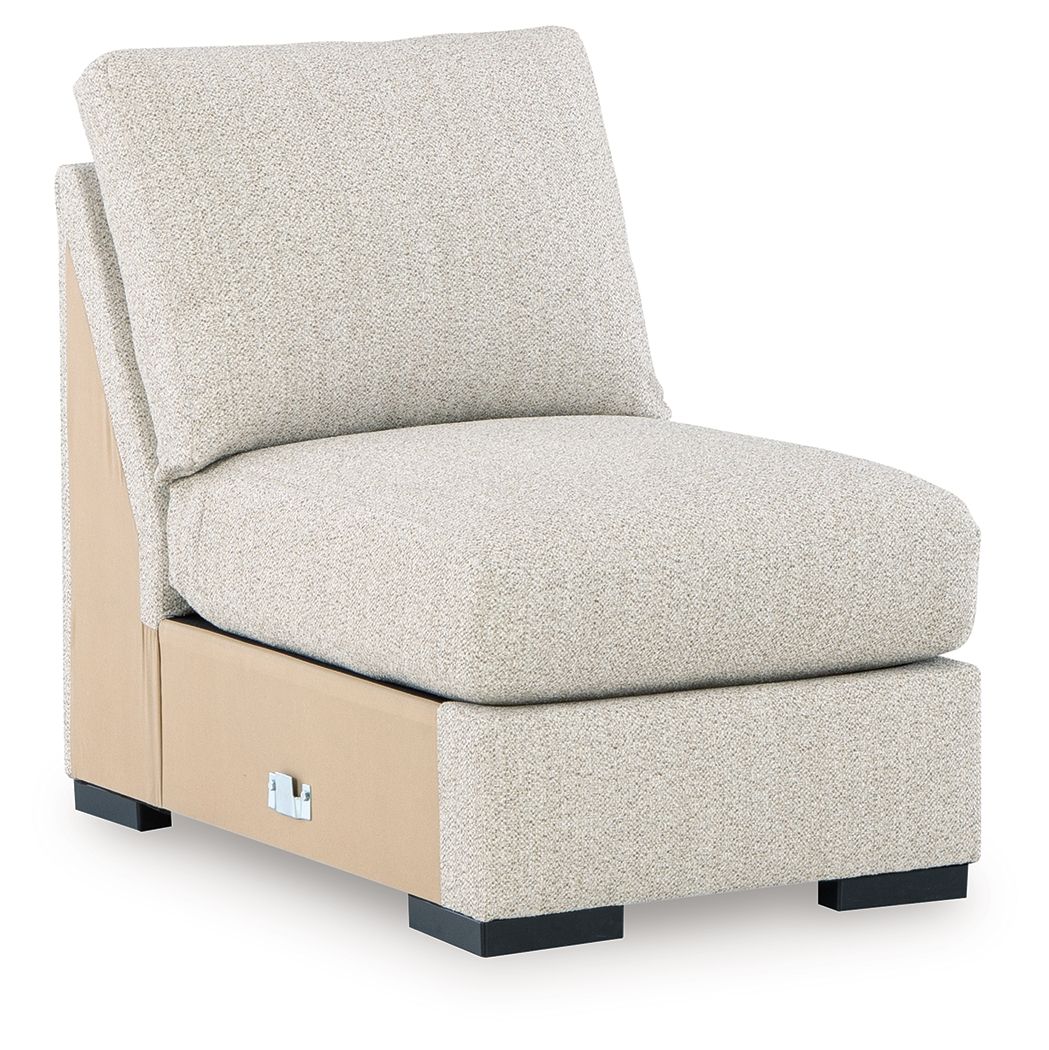 Pebble armless accent chair with textured light beige upholstery and padded seat