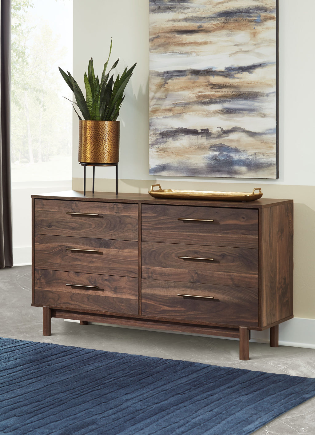 Mocha wood drawer cabinet with brass bar handles, multi-drawer front and open layout