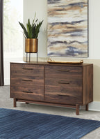 Mocha wood drawer cabinet with brass bar handles, multi-drawer front and open layout