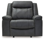 Dark gray rocker recliner chair with tall backrest, padded arms, and stitched front panel.