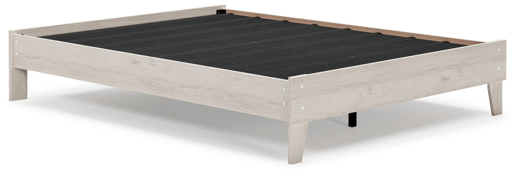 Light wood bed frame with open slats and low side rails