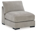 Pebble armless chair with upholstered back and seat, black base feet