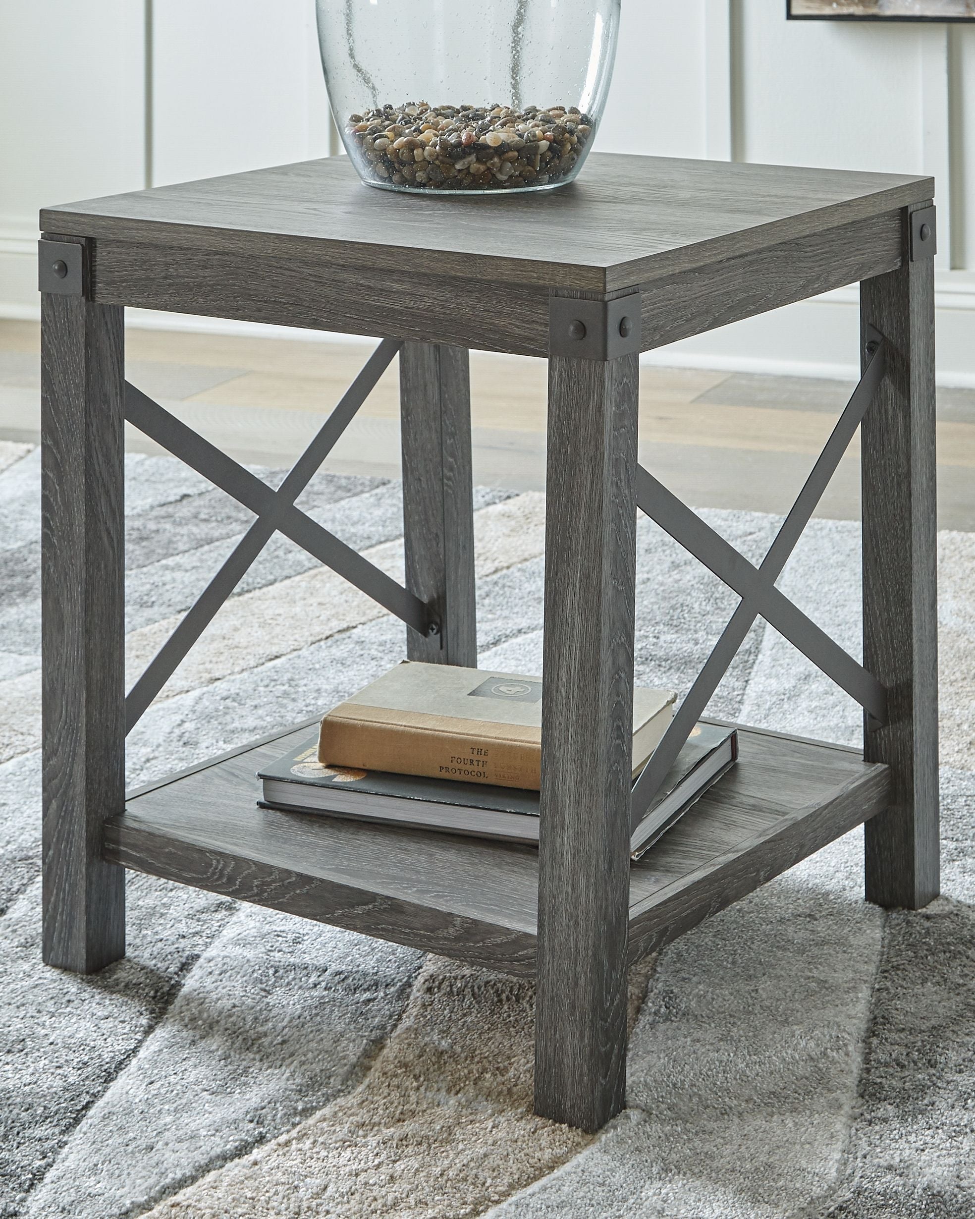 Square end table, grayish brown wood top with X supports and bottom shelf