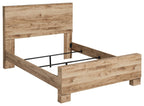 Light beige panel bed with open platform base and visible black metal support