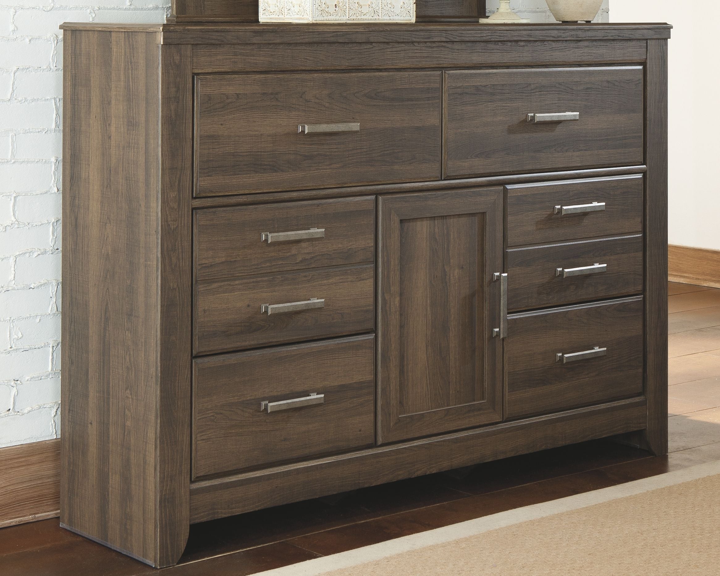 Dark brown wood dresser with 2 doors, 6 drawers, and metal bar pulls