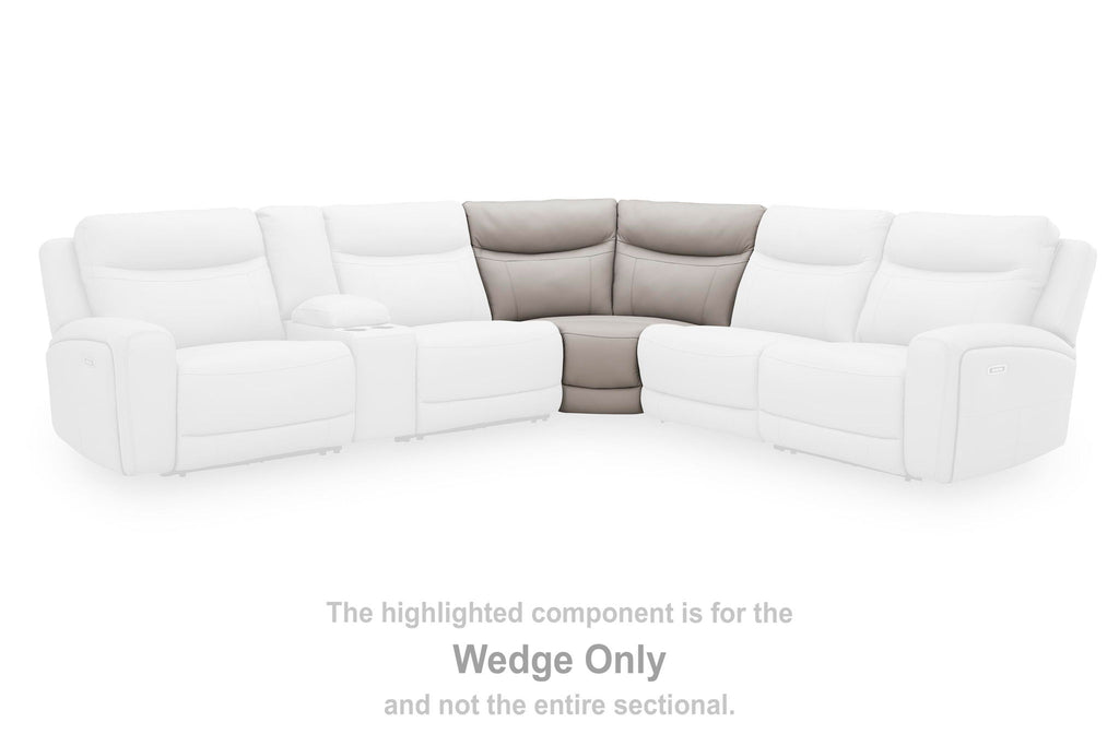 Gray upholstered wedge sectional component with curved arms and backrest