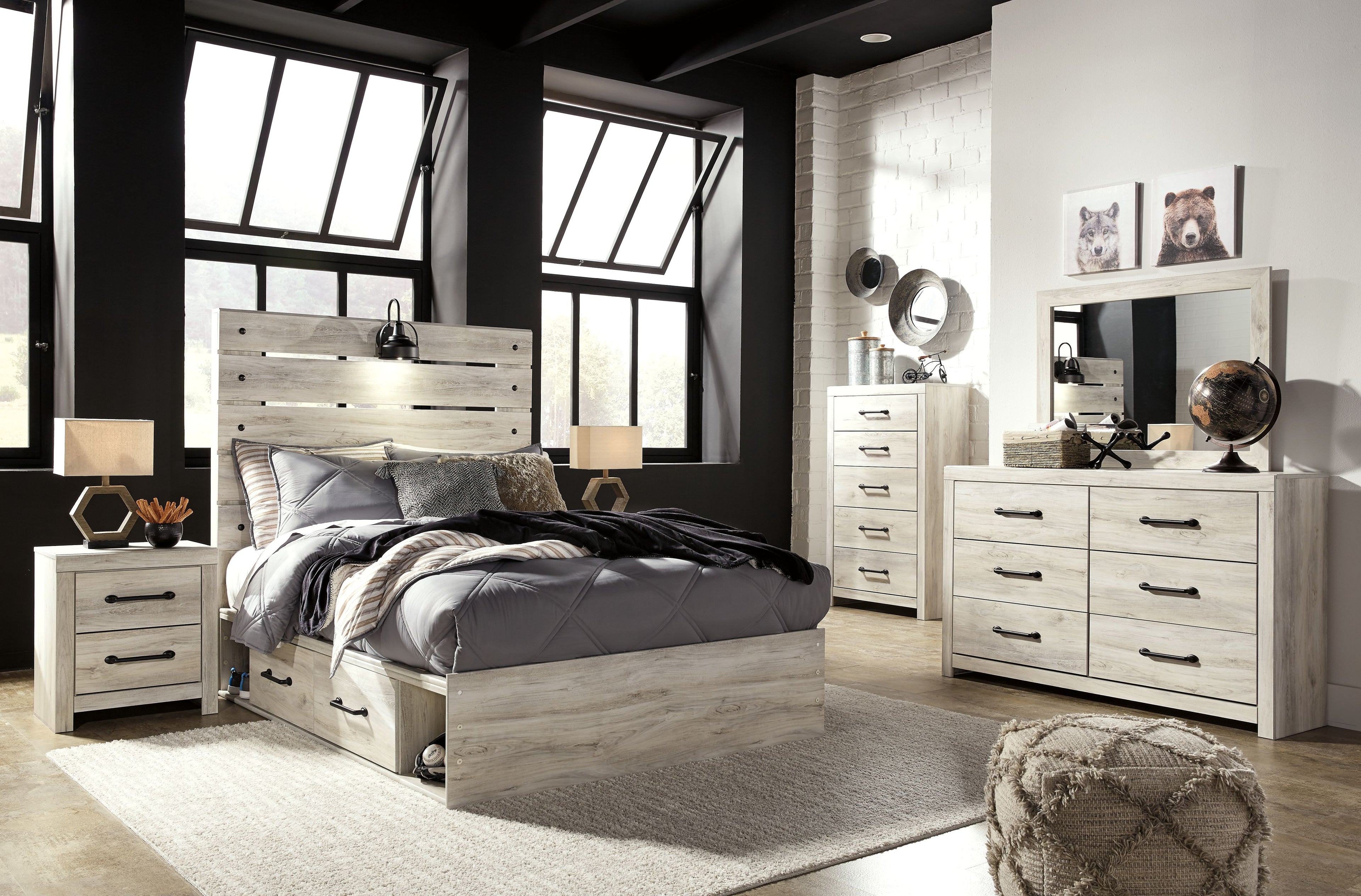 Youth bedroom set with light wood bed, storage nightstands, and dresser with open mirror area