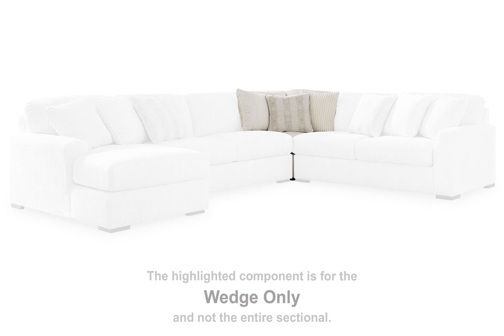 Ivory sectional wedge for modular sofa, shown as highlighted corner seat