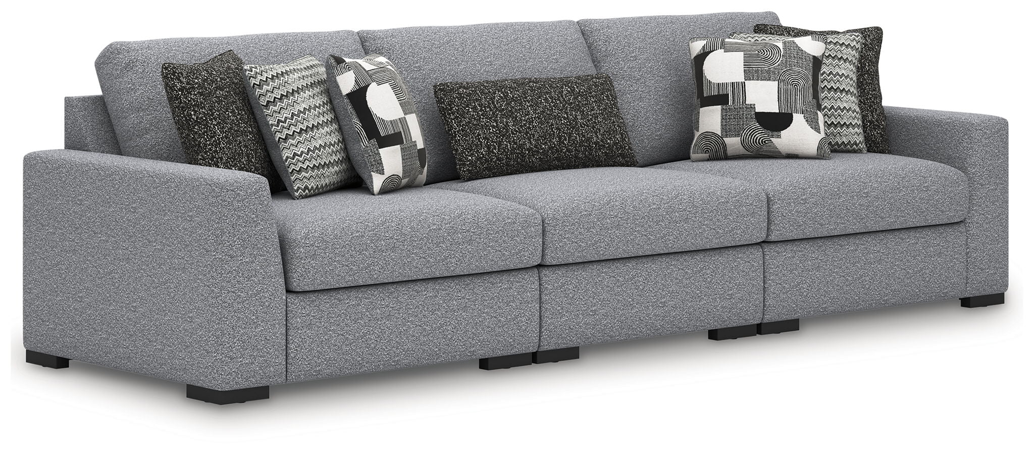 Gray fabric sectional sofa with chaise seats and patterned accent pillows