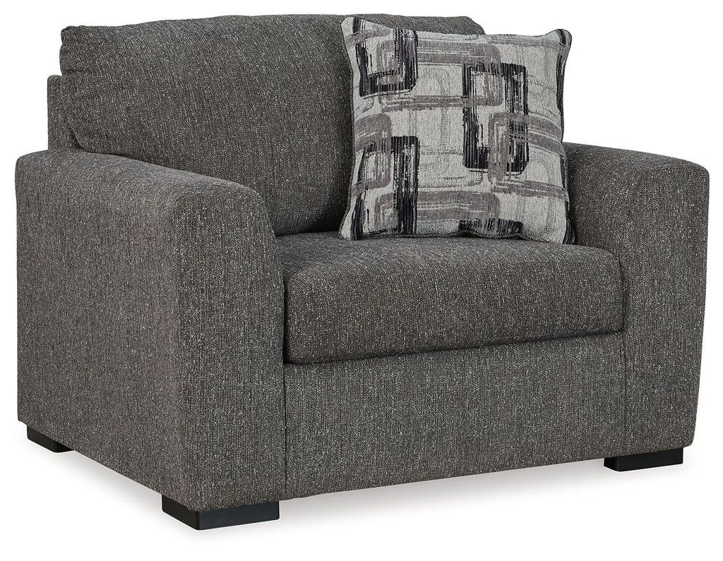 Textured gray chair and a half with rolled arms and square seat, includes patterned pillow