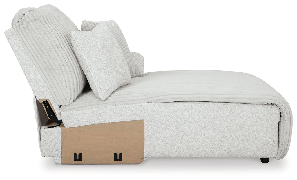 Light gray striped chaise lounge with side frame detail and cushioned back pillows