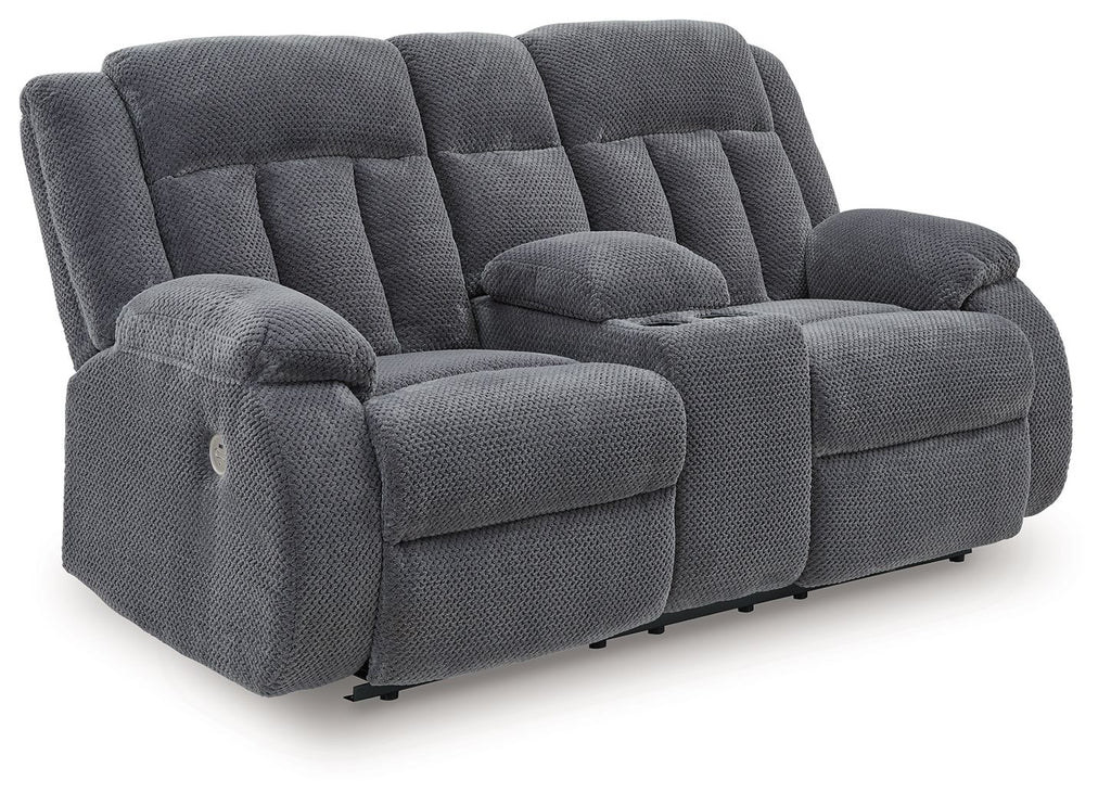 Dark gray double reclining loveseat with center console and cushioned armrests
