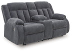 Dark gray double reclining loveseat with center console and cushioned armrests