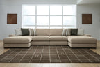 Light brown sectional sofa with chaise ends and striped accent cushions
