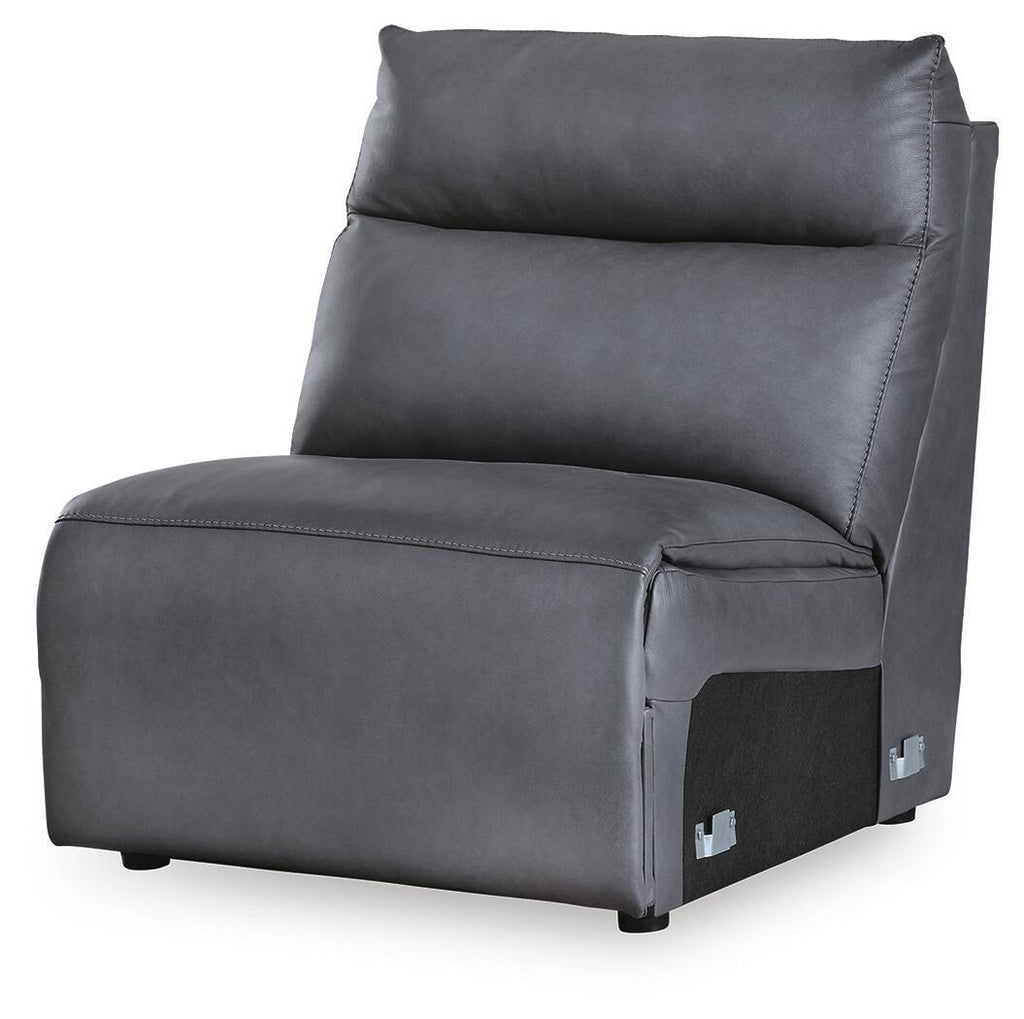 Dark blue armless chair with padded back cushion, stitched seat, and side arm panels