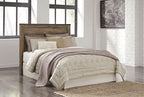 Dark brown panel headboard with tall rectangular panels and flat top for bed.