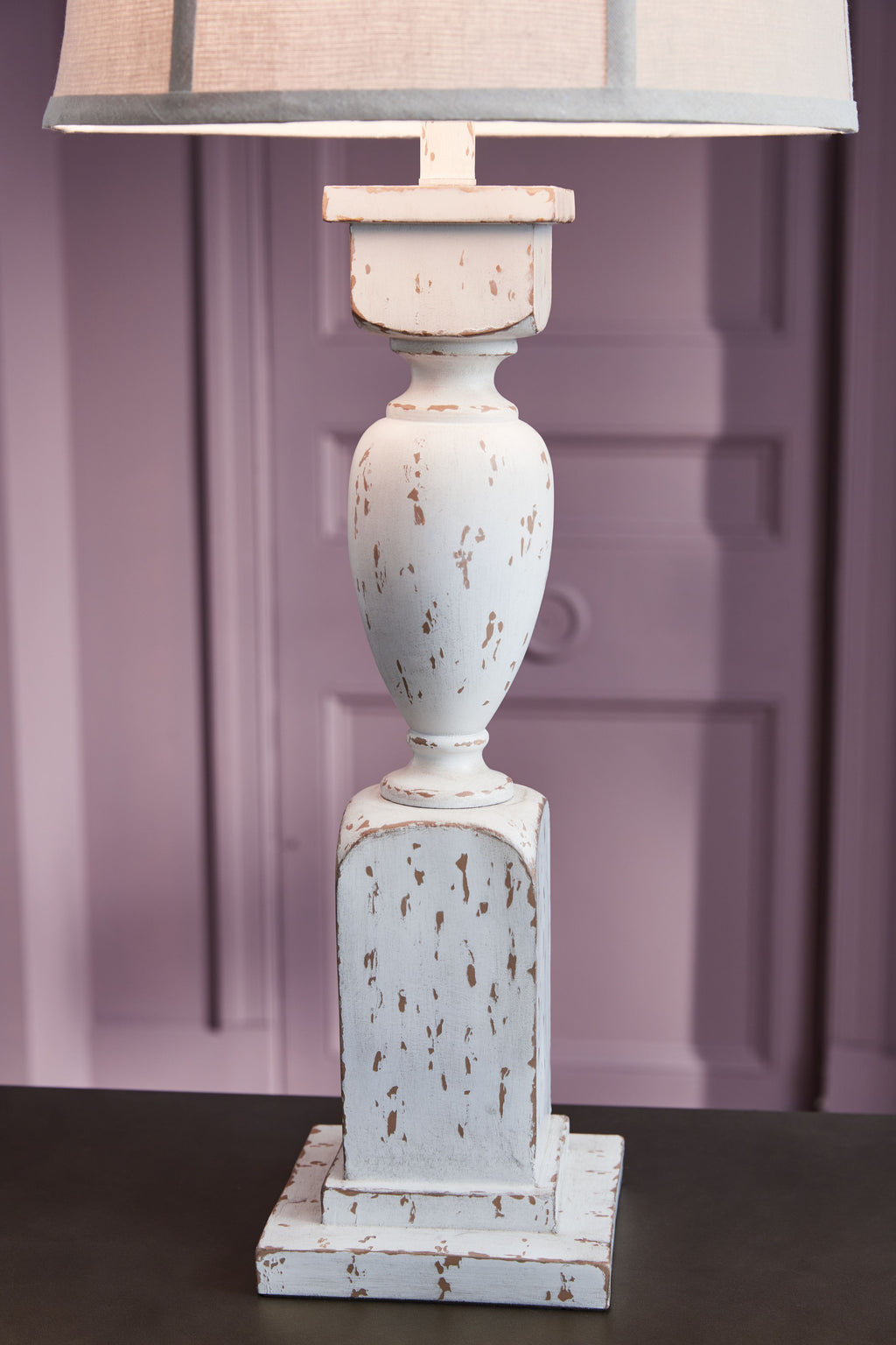 White table lamp base with distressed speckled finish and drum shade