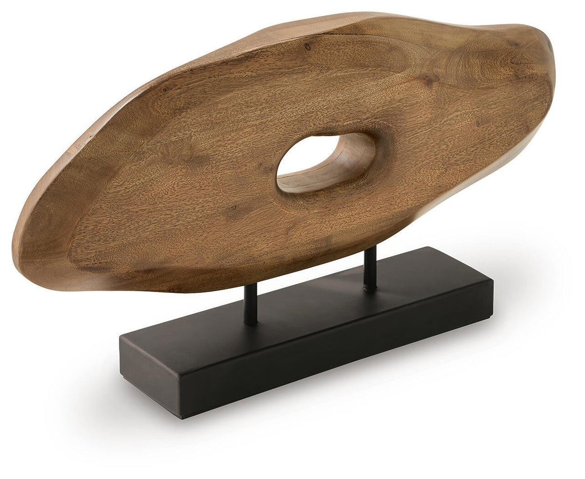 Light brown wooden sculpture with circular opening and central metal supports on black base