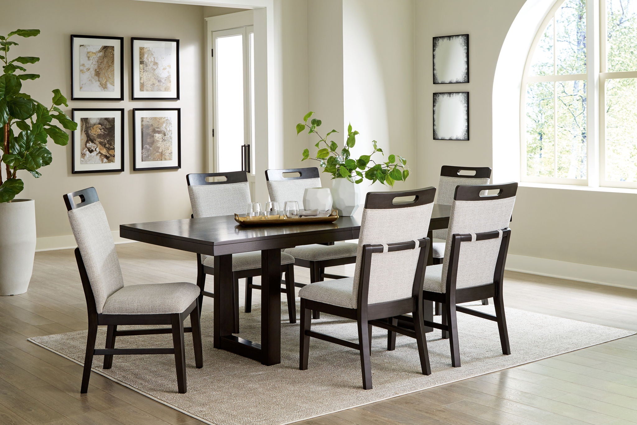 Dining table set with dark grayish-brown rectangular table and six matching upholstered chairs