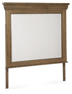 Medium brown bedroom mirror with wood frame and rectangular glass panel